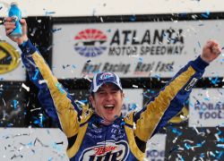 Kurt Busch celebrates in Victory Lane after winning his third NASCAR Sprint Cup series race at Atlanta Motor Speedway. Credit: Rusty Jarrett/Getty Images for NASCAR